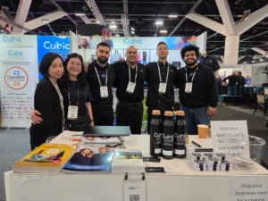 cubic promote staff with clients in an event