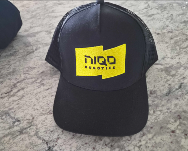 black cap customised with logo