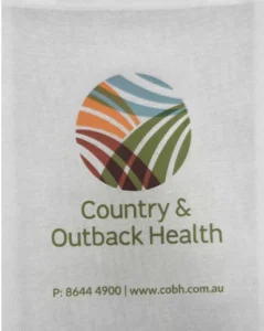 White non-woven tote bag printed with Country & Outback Health full-colour landscape logo, phone number, and website.