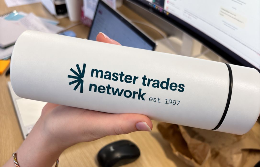 white insulated bottle branded with logo