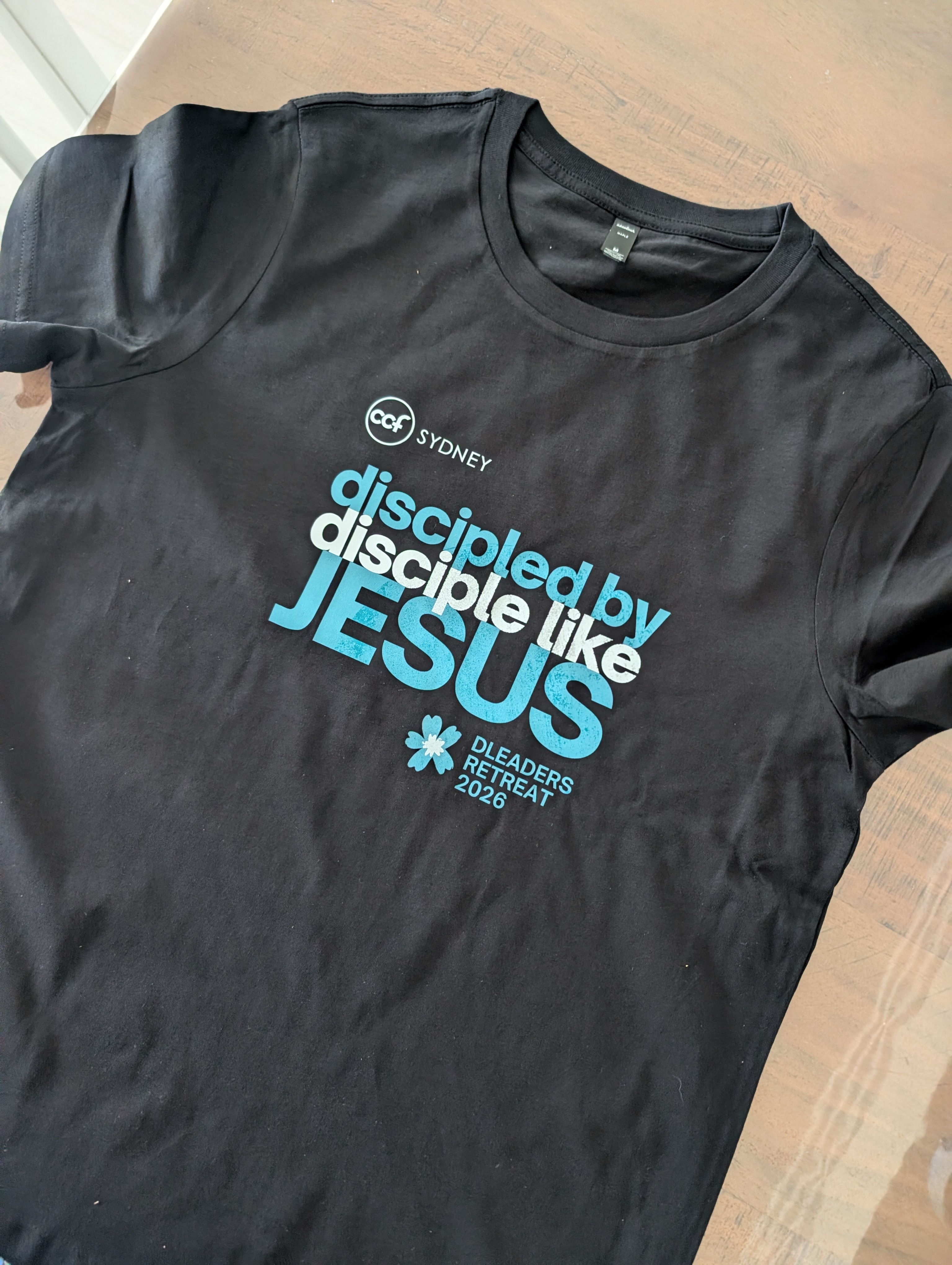 black t-shirt branded with faith message
