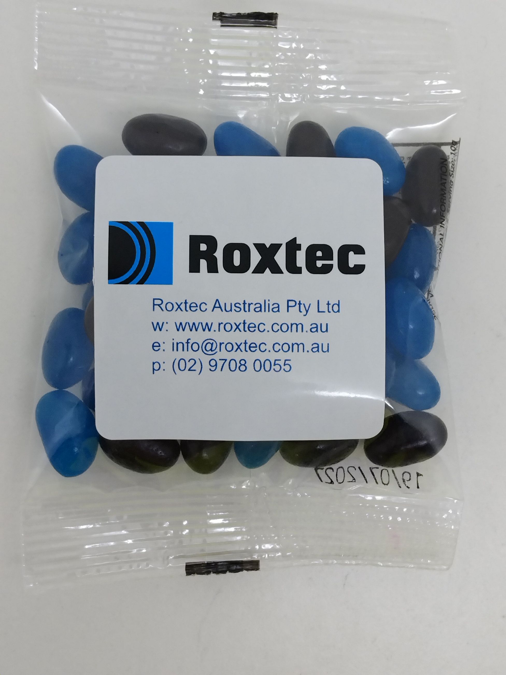 jelly beans with roxtec australia logo, website, and contact information on the label