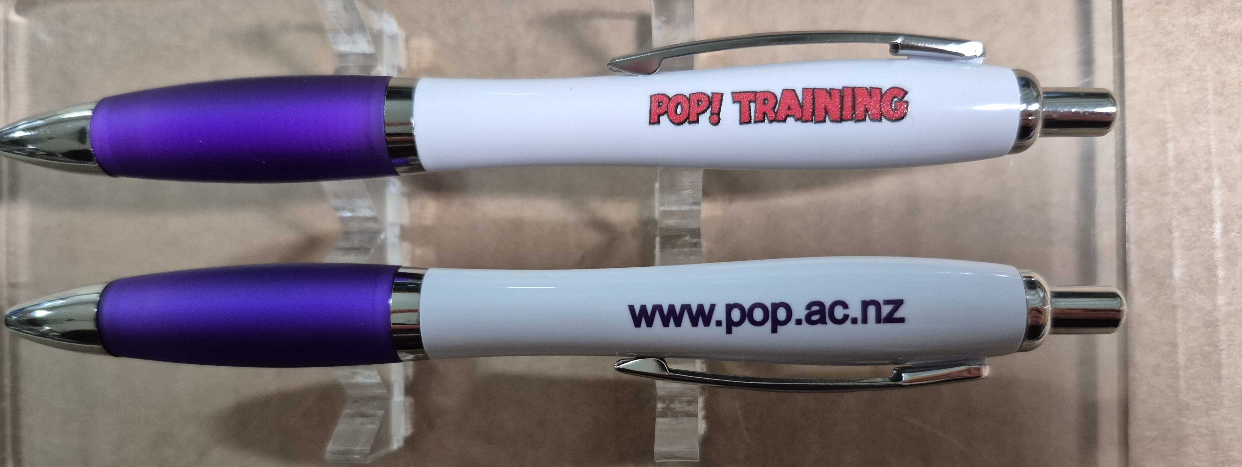 two pens branded with company logo and website