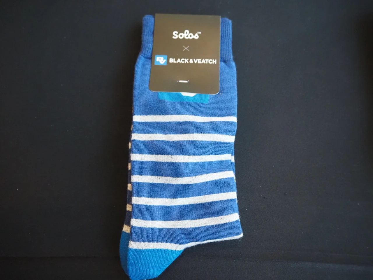 blue and white striped sock branded on the label