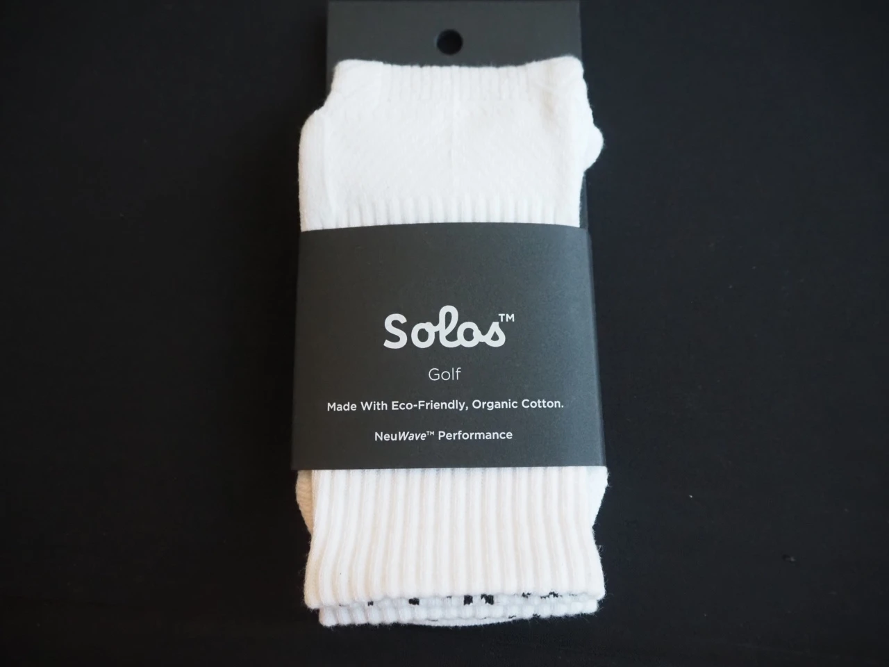 white sock branded with logo on the label
