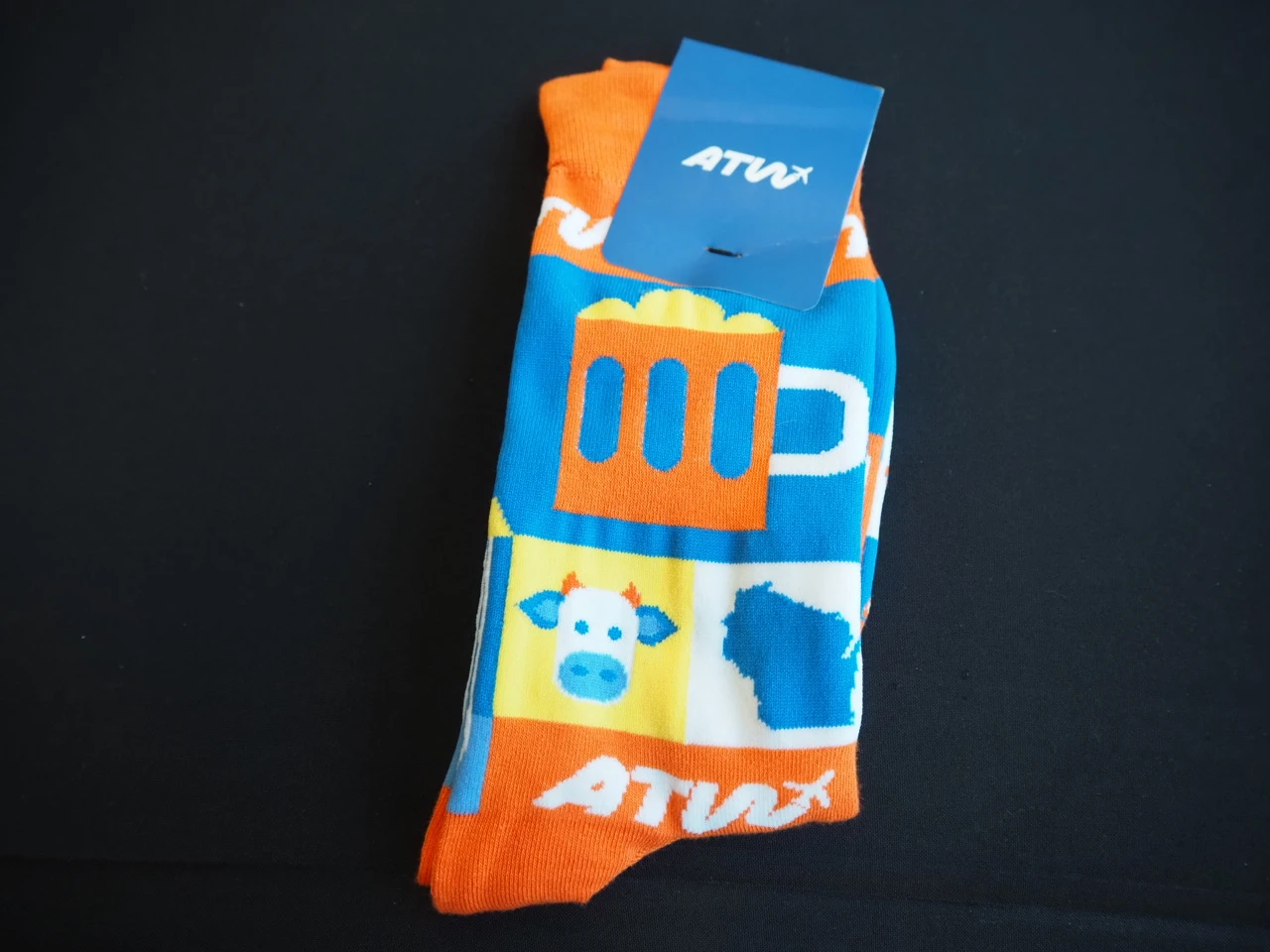 socks with custom design and branded with ATW logo