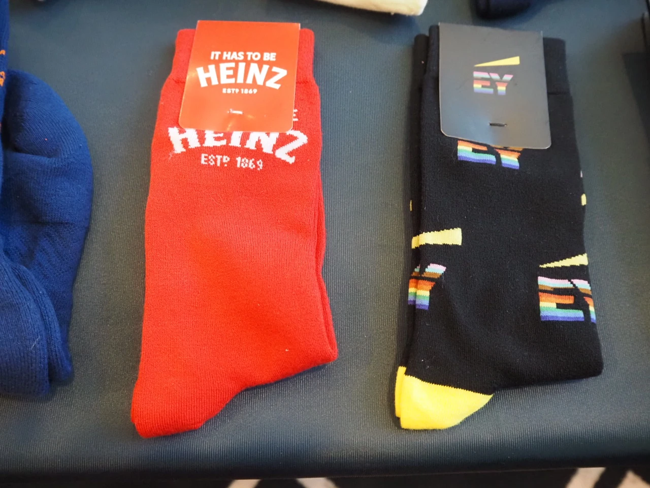 two sock samples branded with logo from an expo