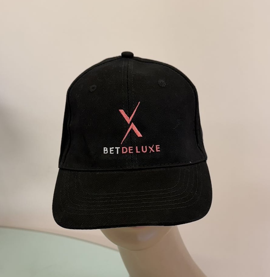 black cap printed with BetDeluxe logo