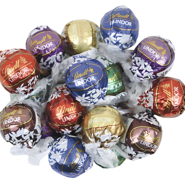 Assorted Lindt Lindor chocolate truffles in colorful wrappers, grouped together.