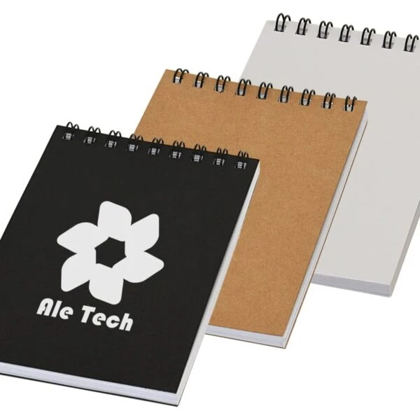 Three spiral notepads with black, brown, and white covers side by side on a white background.