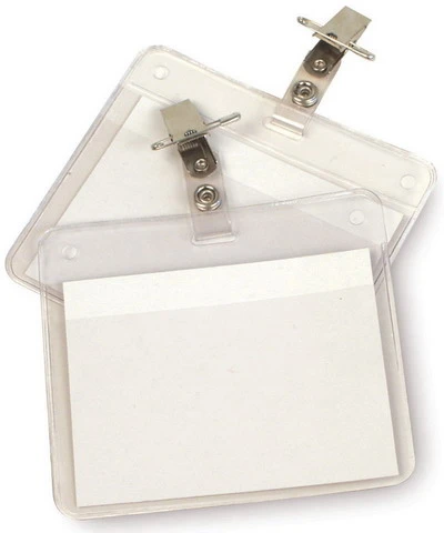Two clear plastic name badge holders with metal clips, each holding a blank white card.