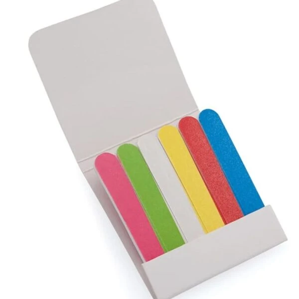 A set of colorful sticky page markers in a white paper folder. The markers are in pink, green, yellow, white, and blue. The folder is open, displaying the markers standing upright in individual slots.