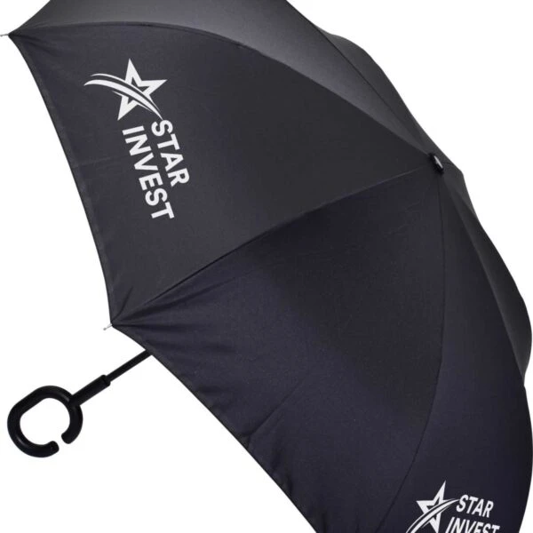 A black umbrella with the text STAR INVEST and a star logo printed in white. It features a unique C-shaped handle for hands-free use.