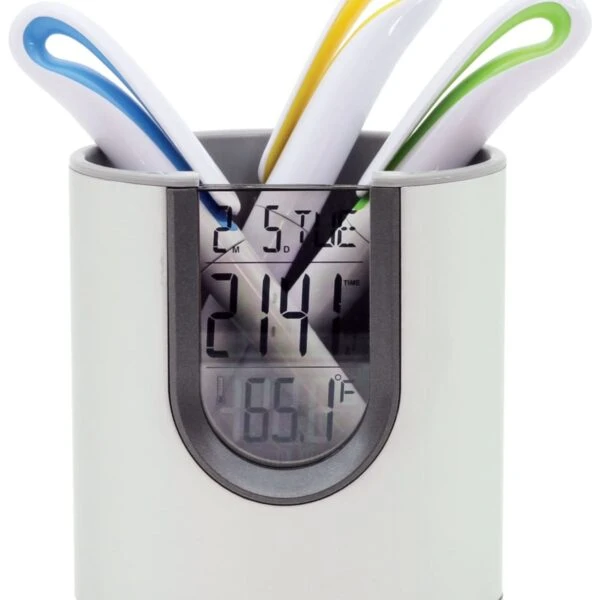 A white digital kitchen tool holder displaying a temperature reading of 65.1°F. Three colorful kitchen probes or utensils are placed inside, featuring blue, yellow, and green handles.