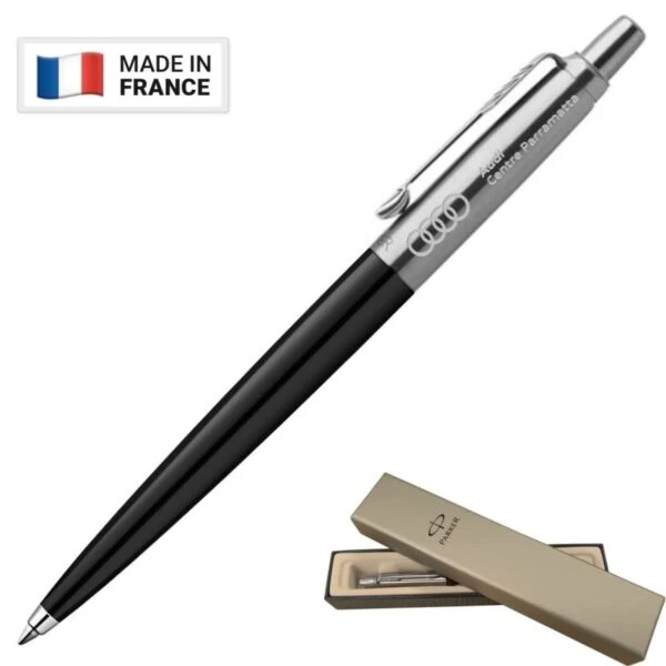 A sleek black and silver pen with a shiny clip. The top reads Audi Centre Parmentier. A small box labeled Prodir is shown. A Made in France label with a French flag is visible in the top left corner.