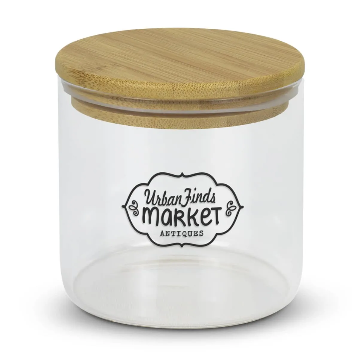 A clear glass jar with a wooden lid labeled Urban Finds Market Antiques. The jar is shown against a white background.