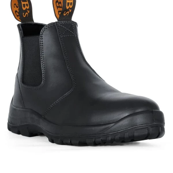 Black slip-on work boot with thick sole and orange pull tabs on heel and tongue.