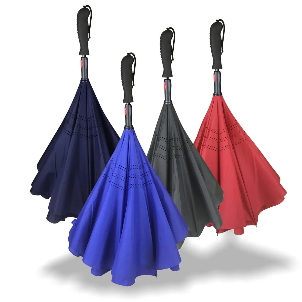 Four inverted umbrellas in blue, navy, gray, and red, standing upright on white background.
