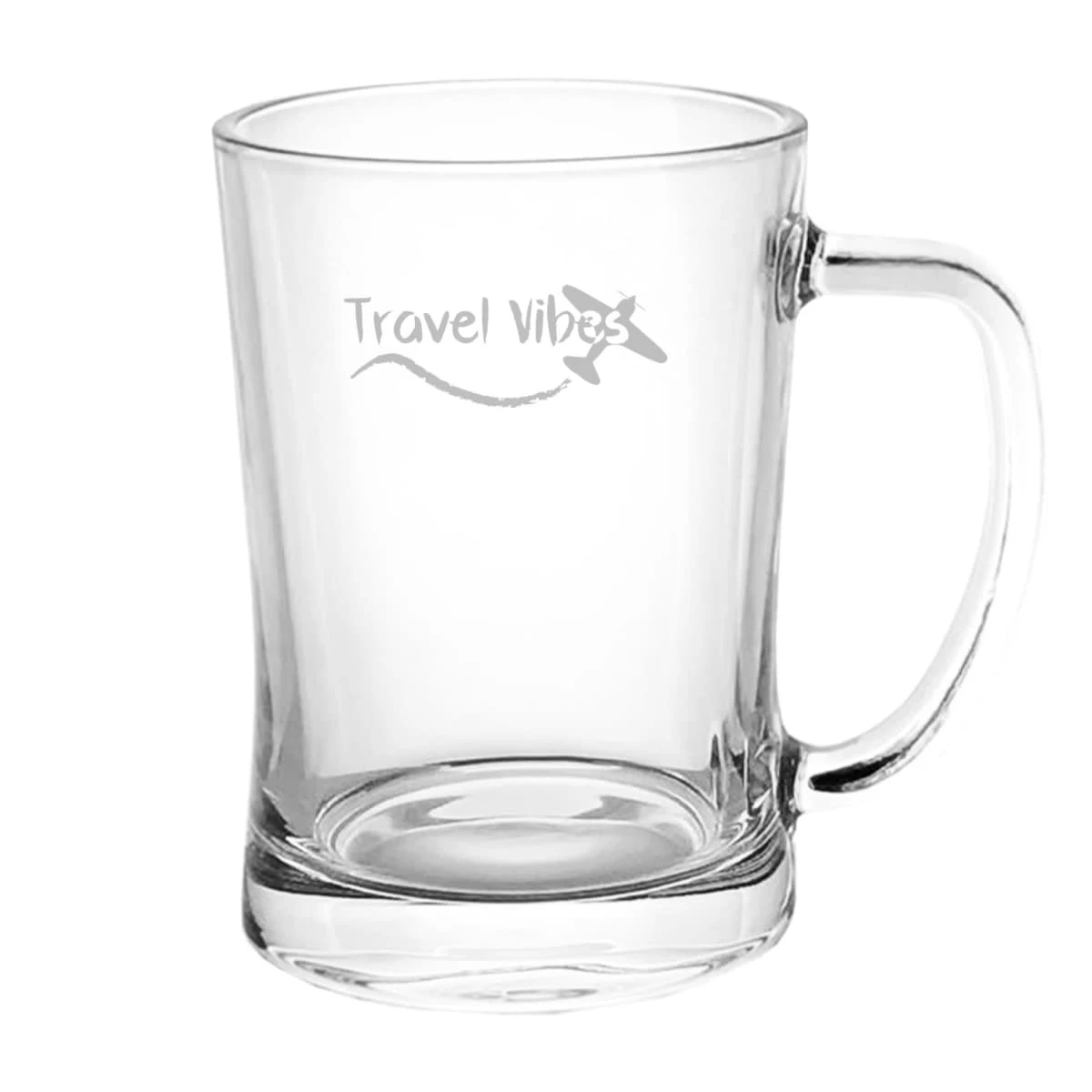 Clear glass mug with Travel Vibes and a plane design engraved on it.